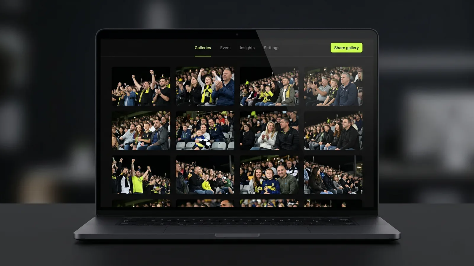 A branded online gallery shown on a laptop